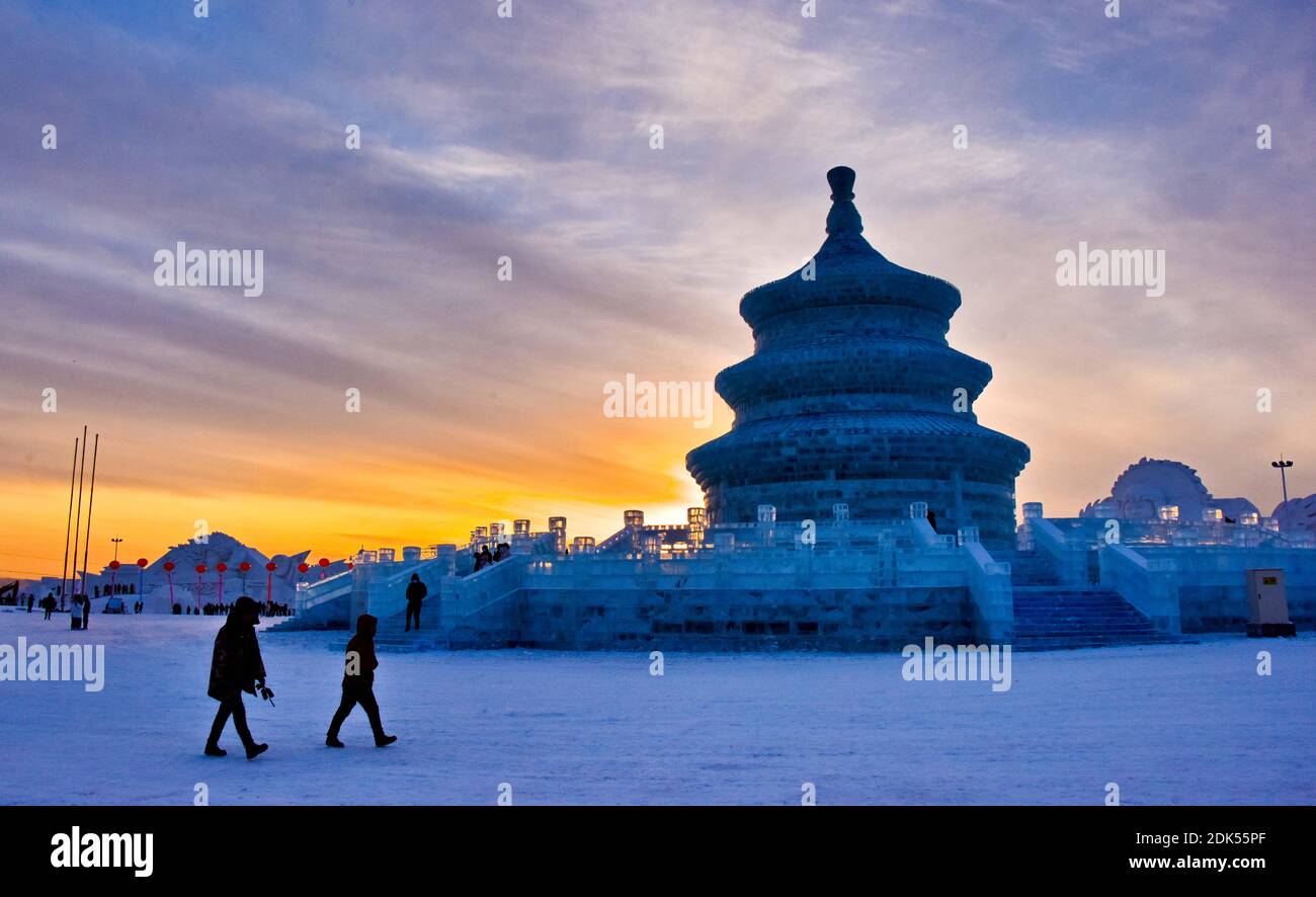 Tourists play in the ice and snow theme park in Erdao district, Changchun city, northeast China's Jilin province, 12 December 2020. The ice and snow t Stock Photo