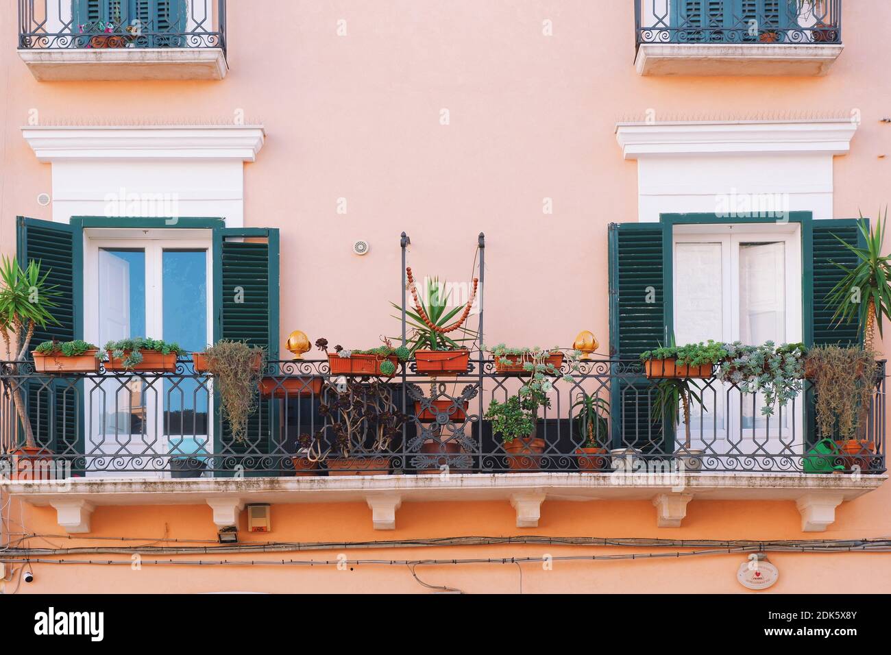 Potted Plants On Balcony Of Building Stock Photo Alamy