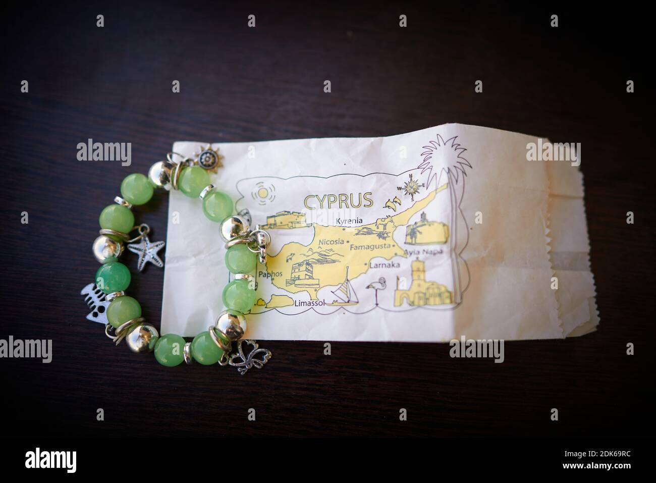 Cyprus souvenir - jade bracelet with silver beads on an envelope with ...