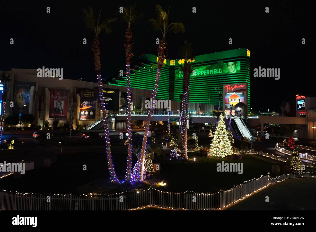 A Christmas tree and holiday decorations at the Tropicana Hotel with the  MGM Grand Hotel & Casino as a backdrop, Sunday, Dec. 13, 2020, in Las Vegas. Stock Photo