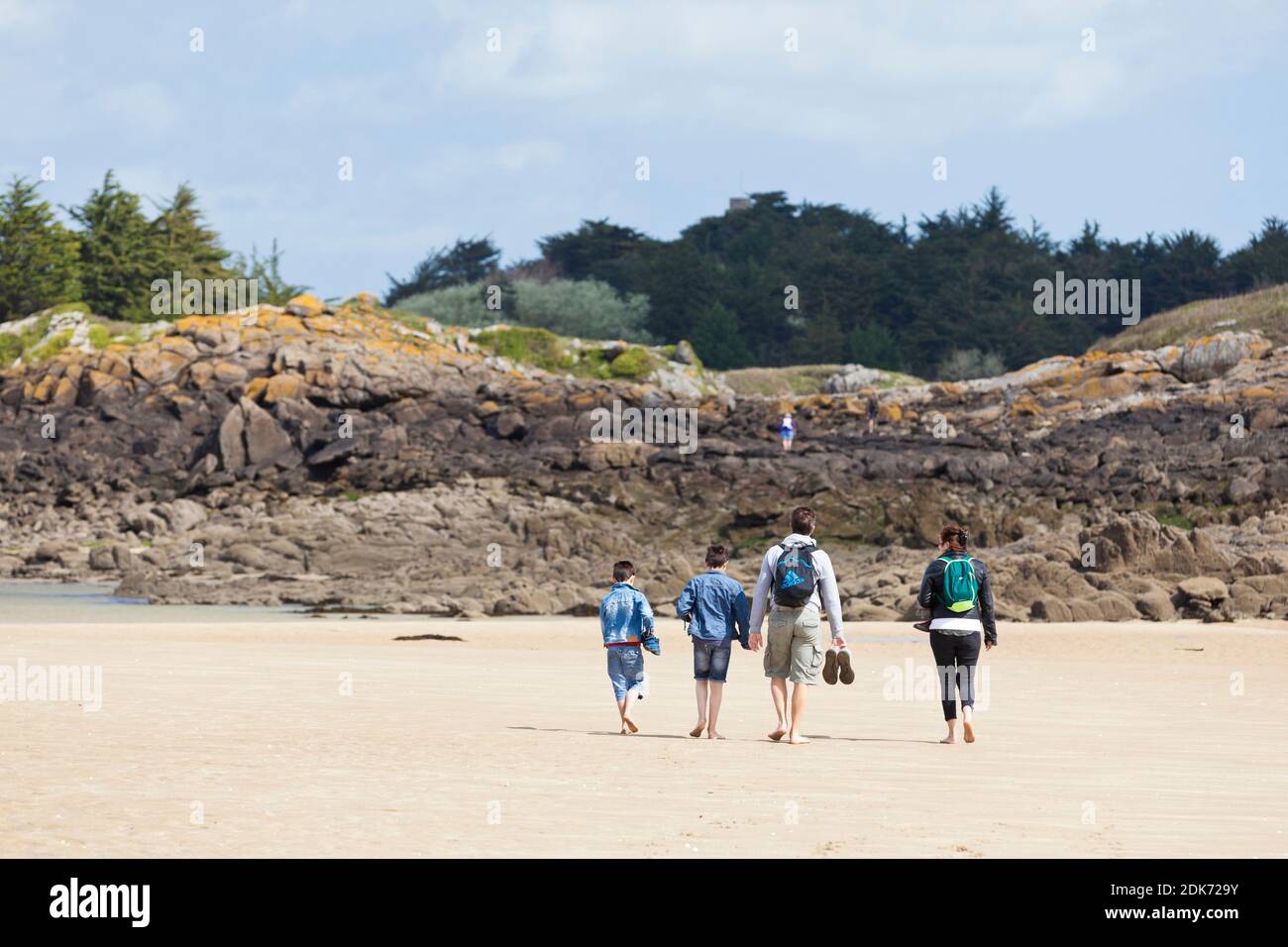 Family excursion to the tidal island Ebihens near Saint Malo in Brittany, France. Stock Photo
