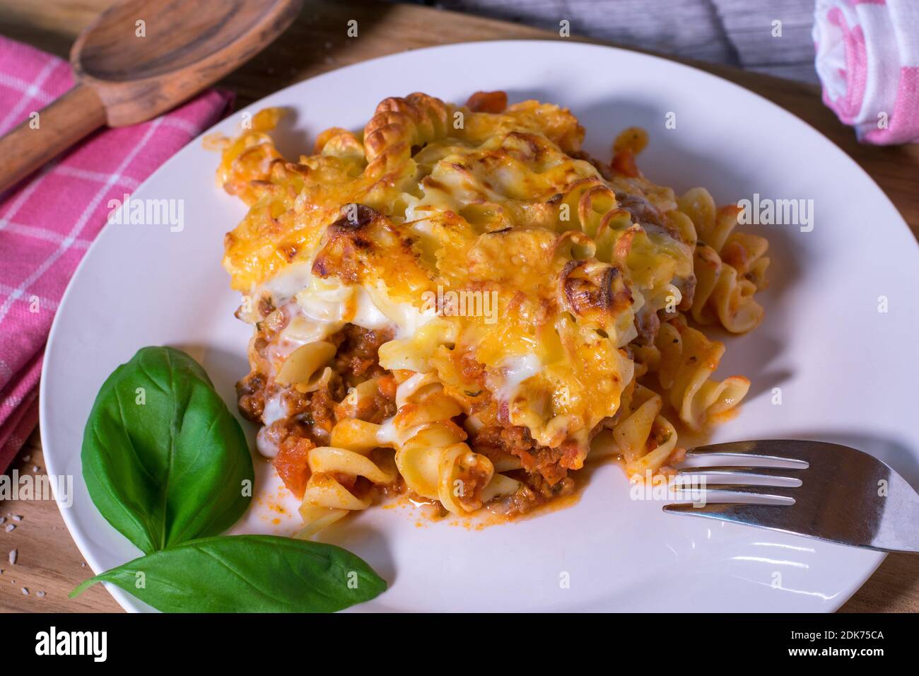 a plate of noodle casserole with bolognese and bechamel sauce Stock Photo