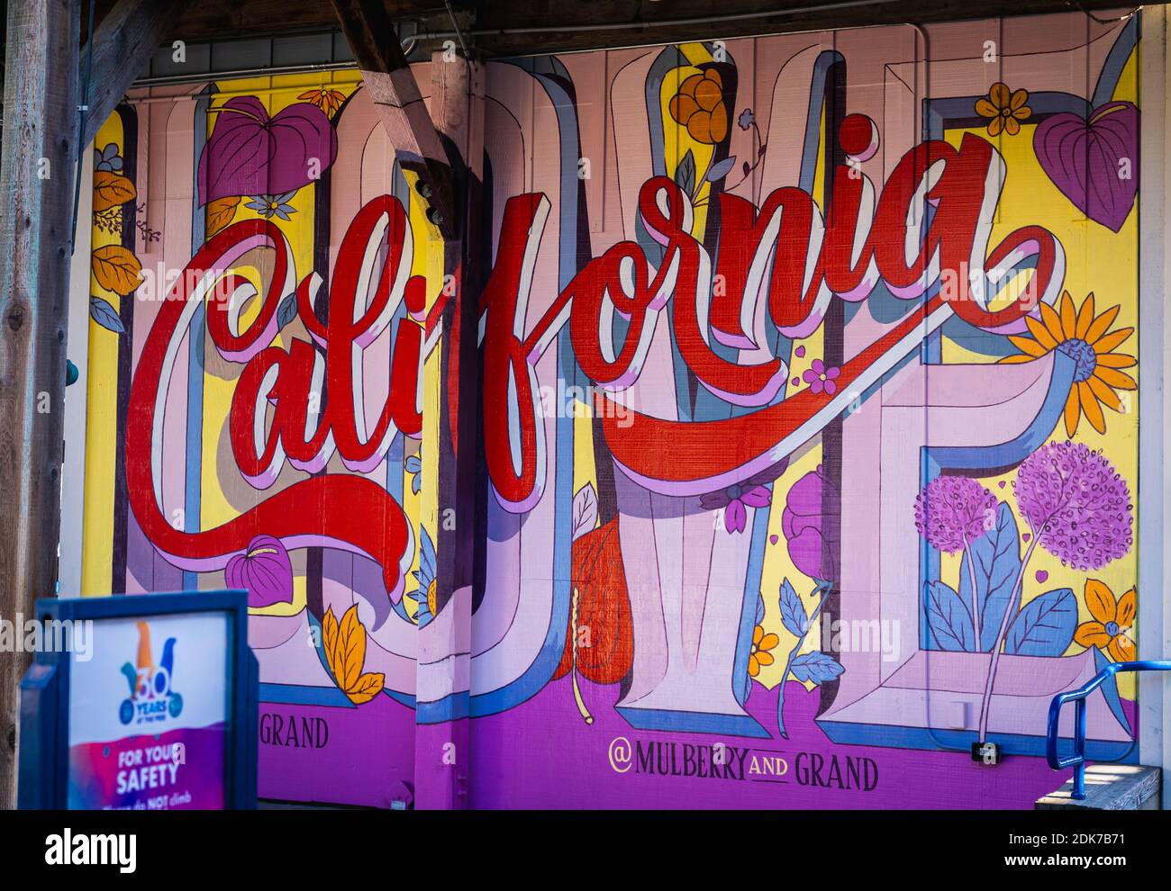 A colorful wall with the word California at Pier 39 Stock Photo
