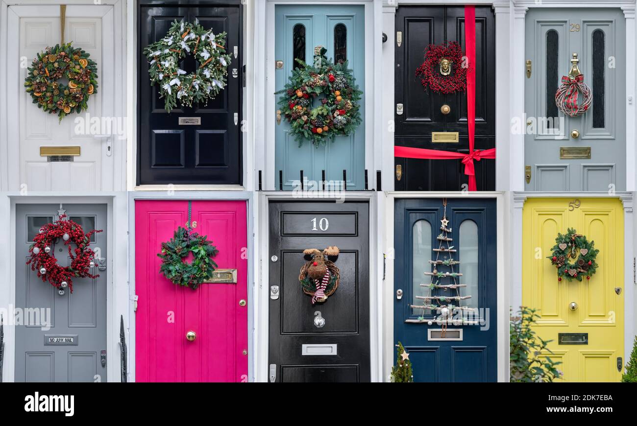 London, UK. 15th December, 2020. Christmas door wreath collage. Festive Christmas  wreaths and decorations hang on the many colourful doors of homes in  Belgravia. Credit: Guy Corbishley/Alamy Live News Stock Photo -