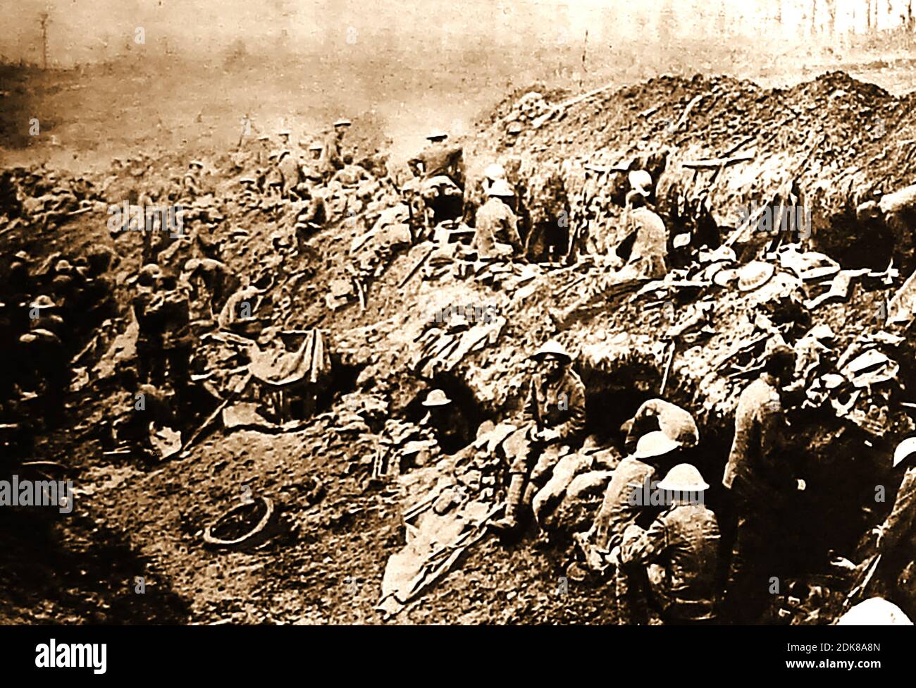 WWI on the Somme - British soldiers withdrawn from the front line after a battle, rest in abandoned trenches. After completing their stint at the front line, units were sent to the rear of the battlefield for rest, and later for recreation and further training in near 'normal' conditions far removed from the hardship and horror of the front line trenches. Stock Photo