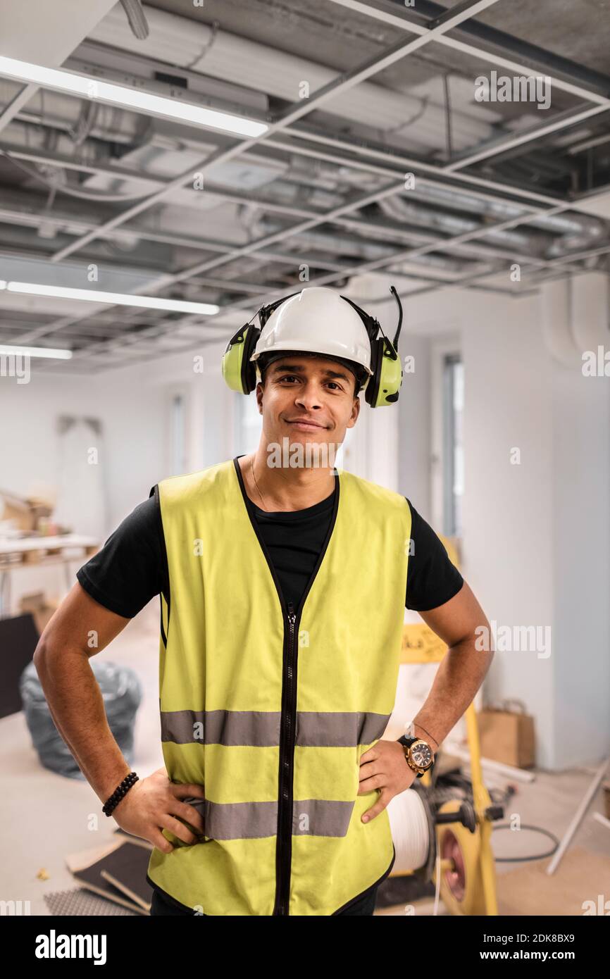 Portrait of worker wearing hardhat Stock Photo