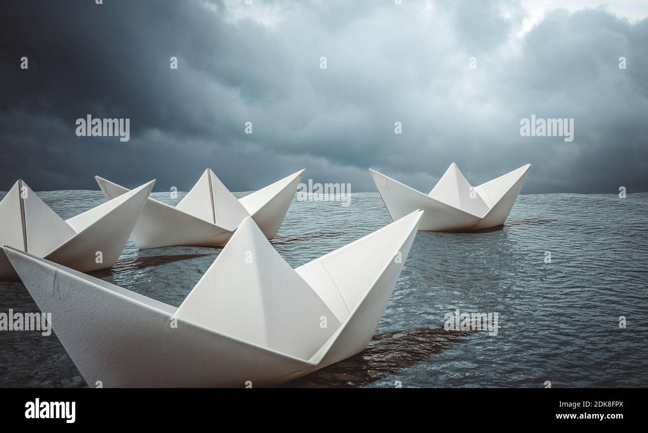 group of paper boats sailing in open ocean. concept of courage and vision. 3d render. Stock Photo