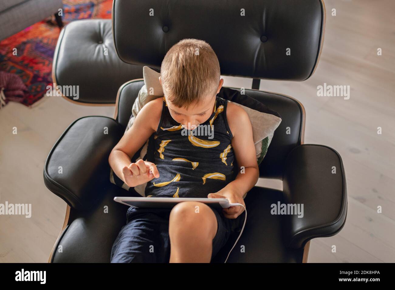 Boy using digital tablet Stock Photo