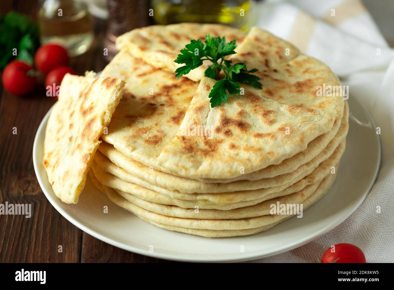 Khachapuri. Georgian traditional dish made from sulguni cheese and bread. Selective focus Stock Photo