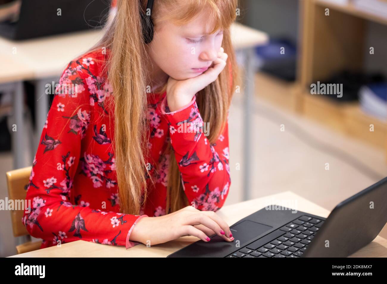 Girl in classroom using laptops Stock Photo - Alamy