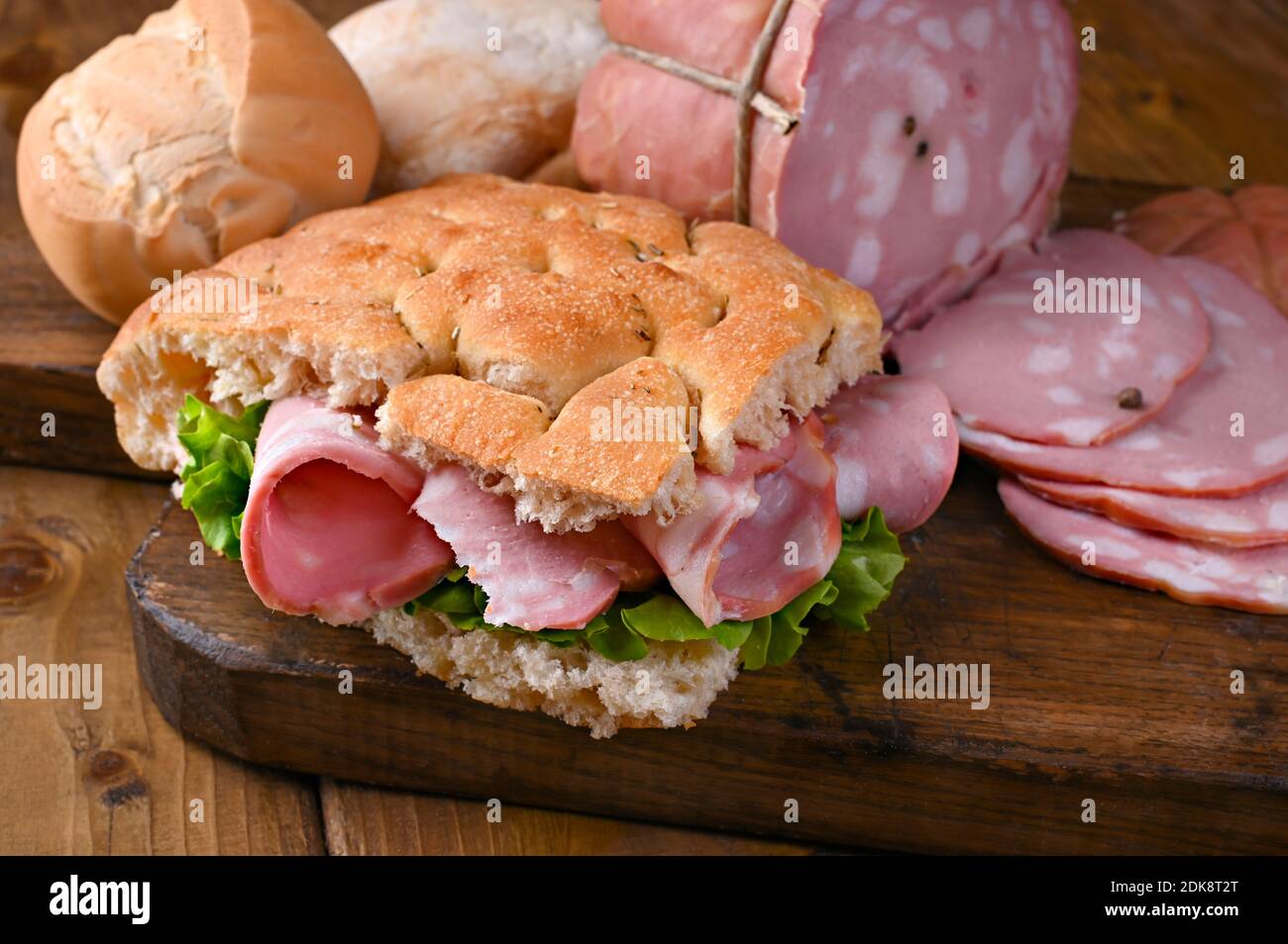 Focaccia with rosemary Italian mortadella for lunch. Traditional food