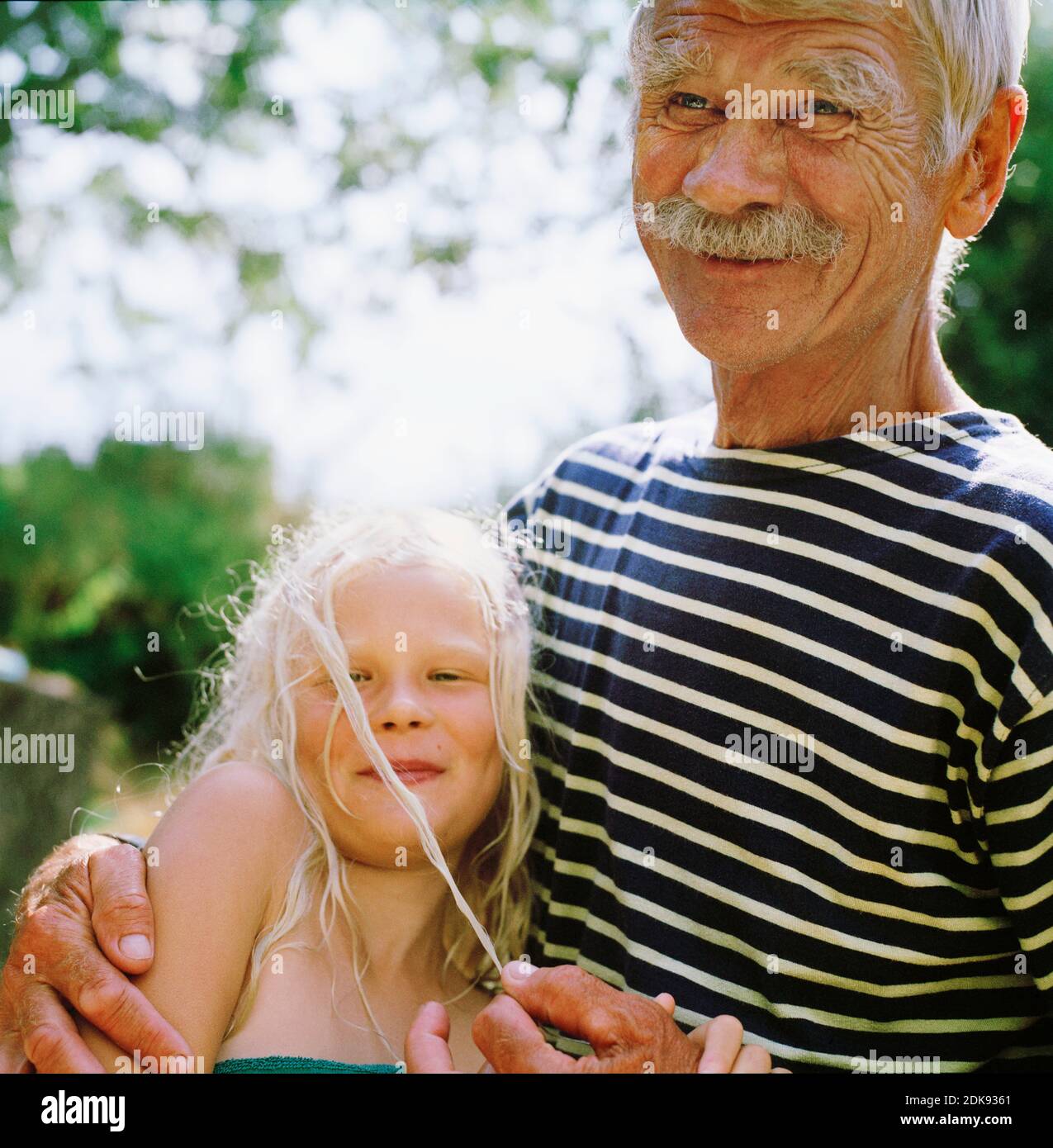 Grandfather with granddaughter Stock Photo