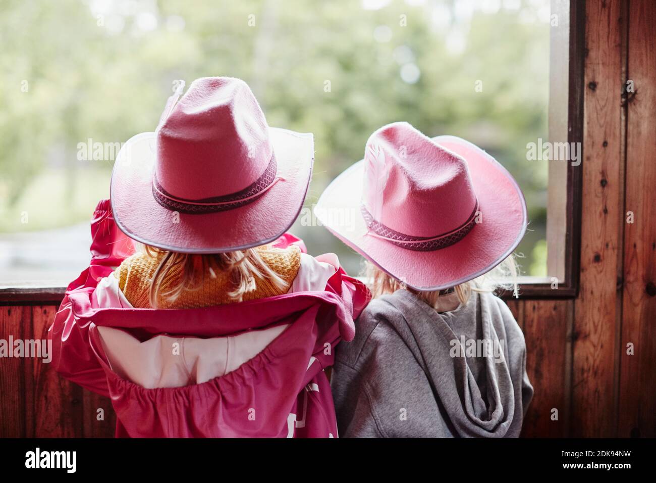 Girl wearing pink cowboy hats Stock Photo