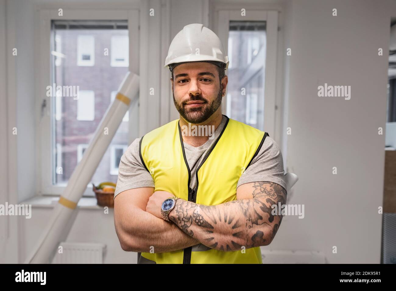 Portrait of worker wearing hardhat Stock Photo