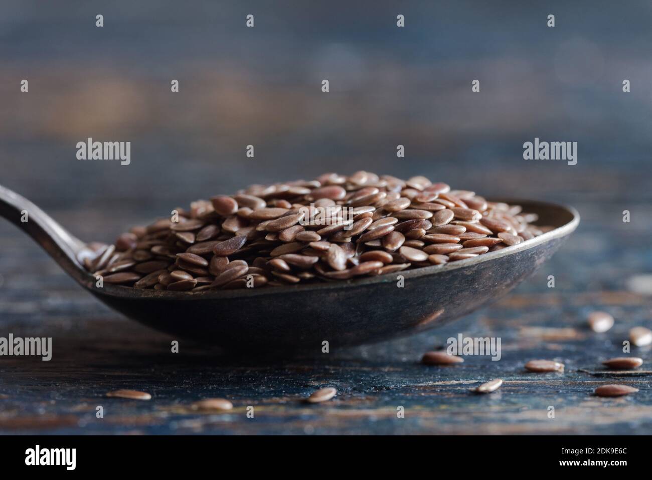 Close-up Of Flax In Spoon On Table Stock Photo