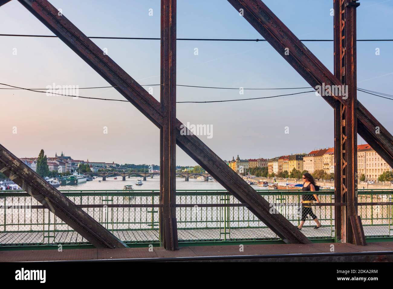 Praha, river Vltava (Moldau), railway bridge at Vysehrad, view to North, person walking in Vltava, Moldau, Praha, Prag, Prague, Czech Stock Photo