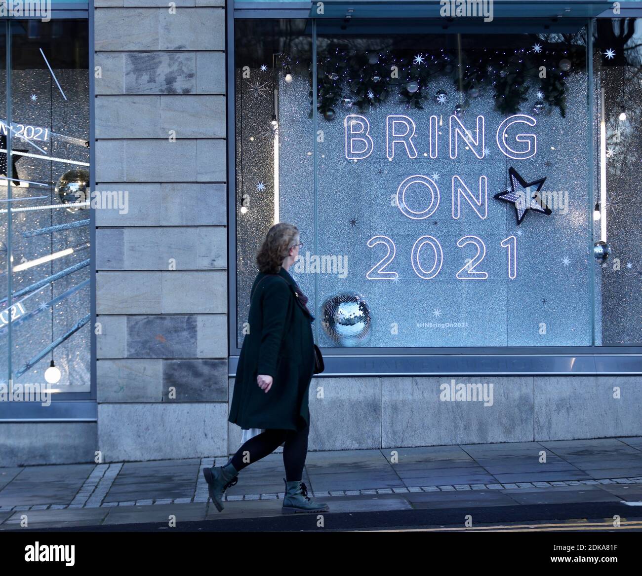 Edinburgh, United Kingdom. 23 March, 2020 Pictured: As Edinburgh is set to remain in Level 3 of the Scottish Government COVID protection levels, a few shoppers hit the streets to complete their Christmas shopping. Credit: Rich Dyson/Alamy Live News Stock Photo