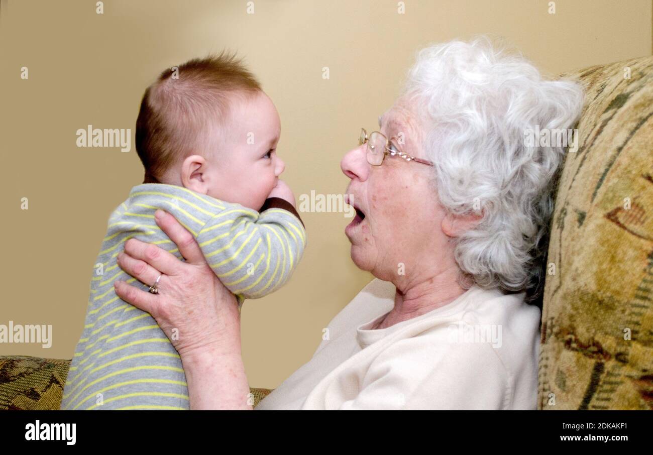 Boy making love to grandma Grandma Making Faces At A Baby Boy Trying To Get Him To Smile Stock Photo Alamy