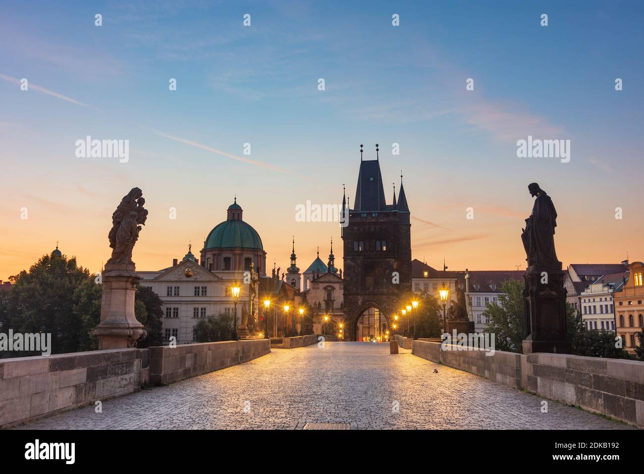 Praha, Charles Bridge (Karly most, Karlsbrcke), Old Town Bridge Tower (Staromestska mostecka vež), sunrise in Vltava, Moldau, Praha, Prag, Prague, Czech Stock Photo