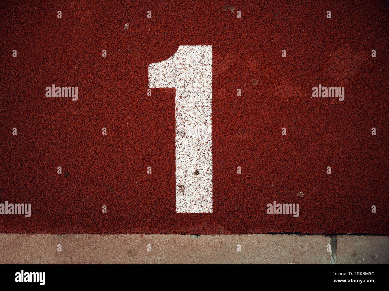 Closeup view of number on athlete path Stock Photo - Alamy