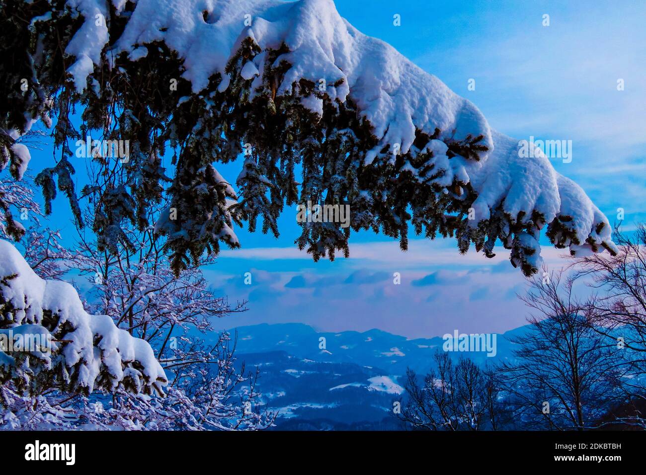 Scenic View Of Snowcapped Mountains Against Sky Stock Photo