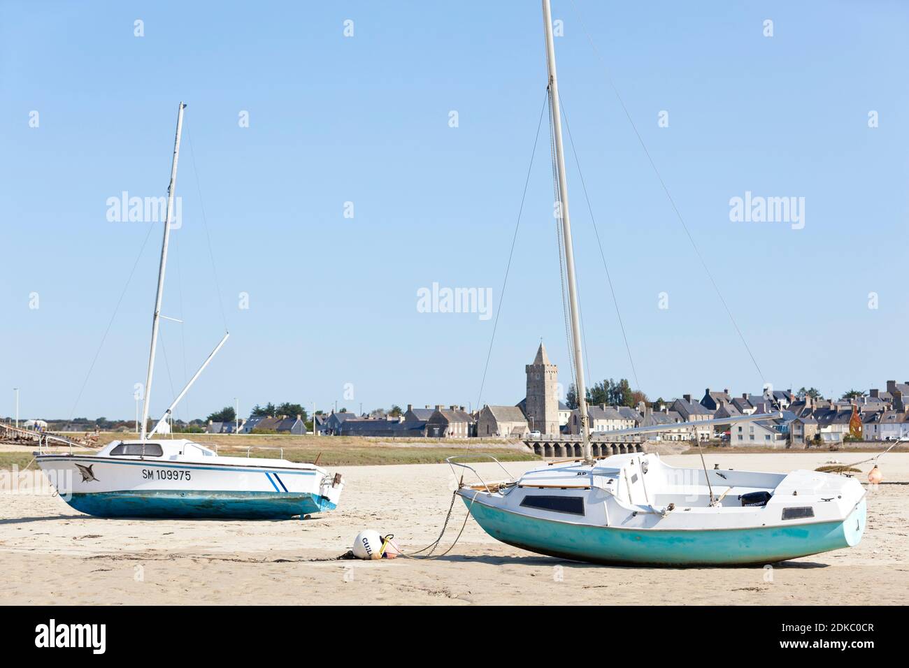 The natural harbor at Portbail in Normandy at low tide in summer