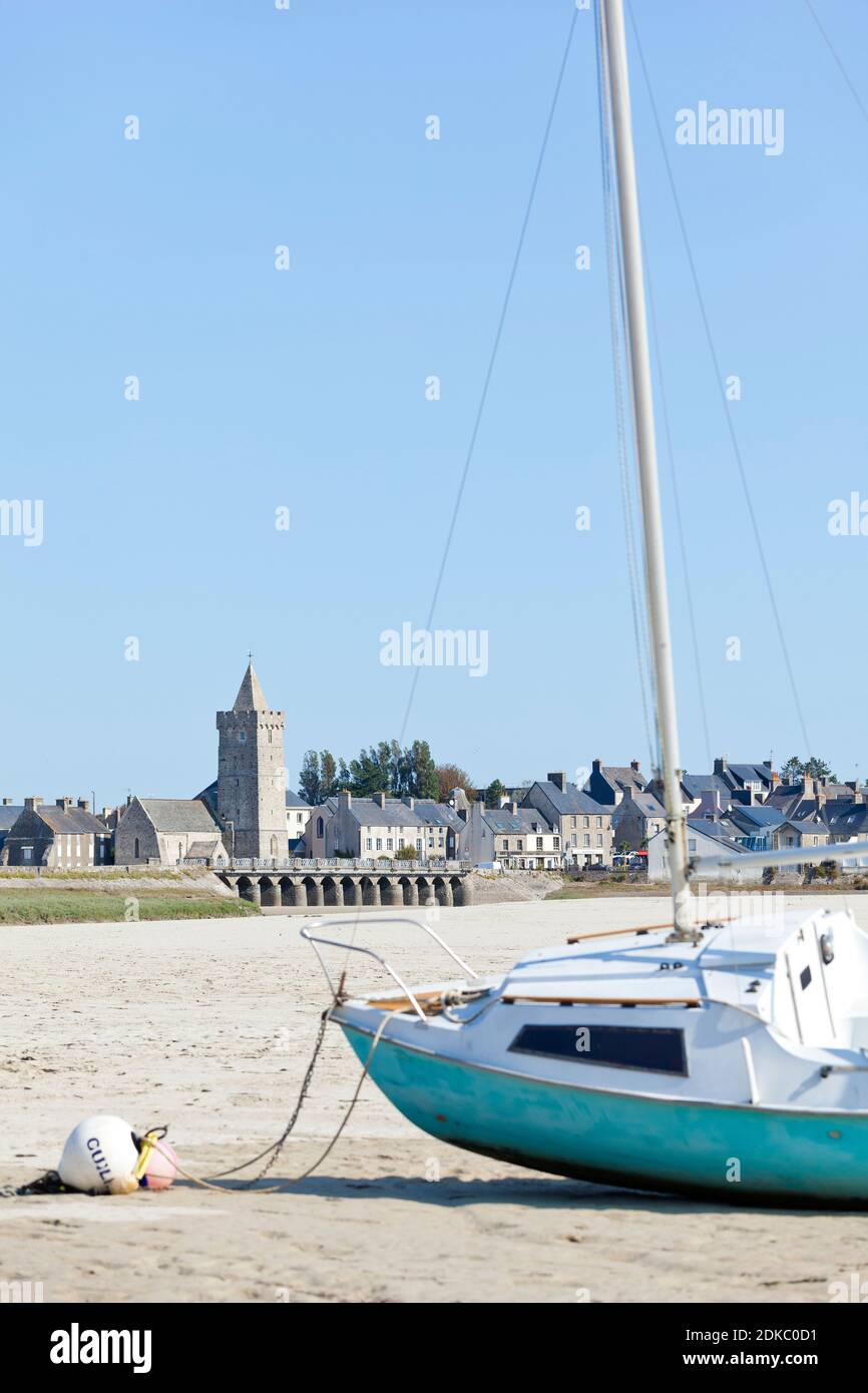 The natural harbor at Portbail in Normandy at low tide in summer