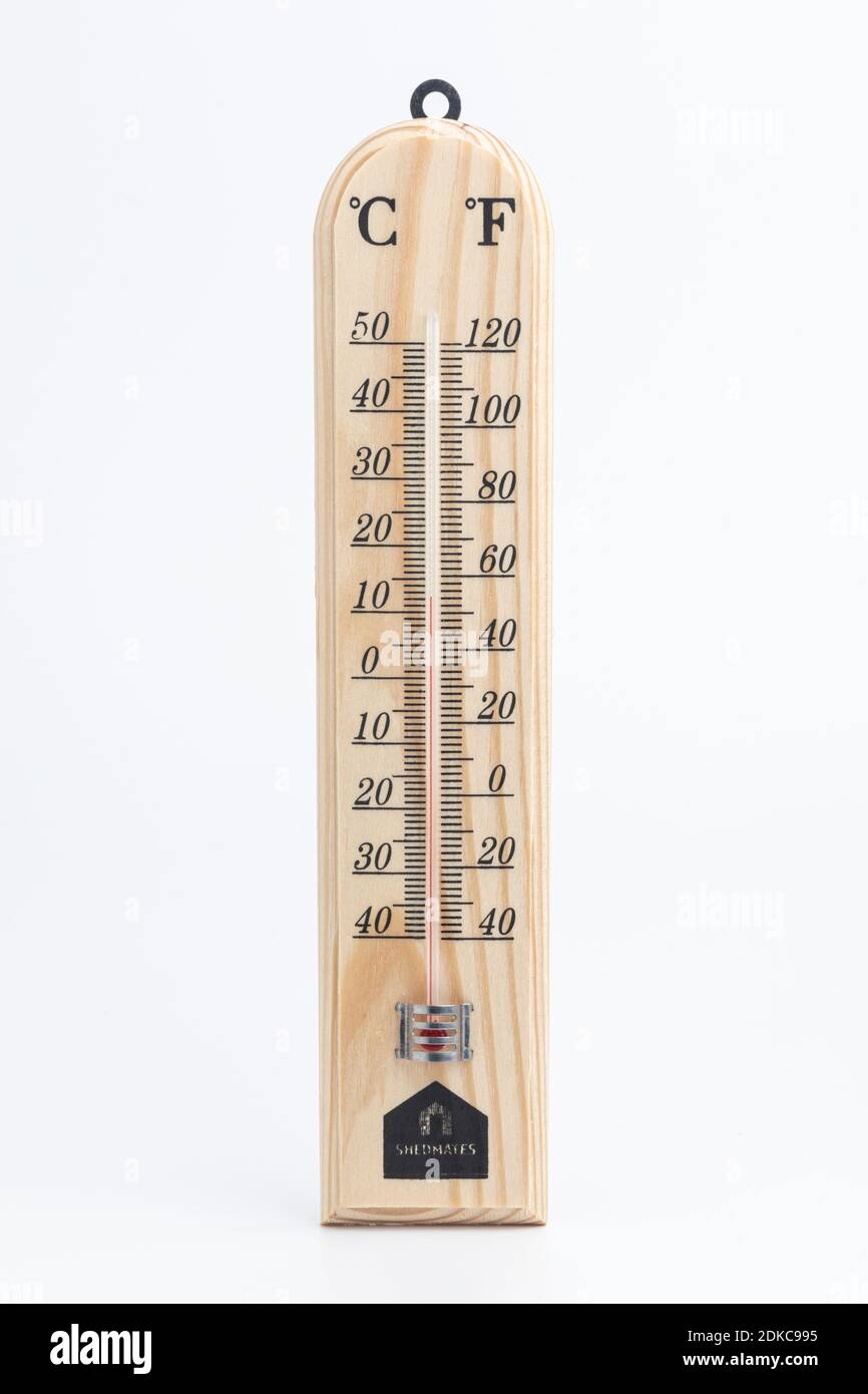 A wooden Celsius and Fahrenheit thermometer. Stock Photo