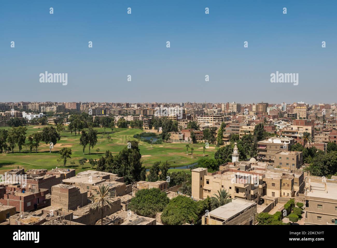 Aerial view of Cairo of red brick houses from the Giza pyramid complex