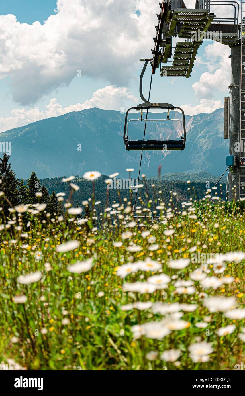 Chair Lift Over Mountains Against Sky Stock Photo