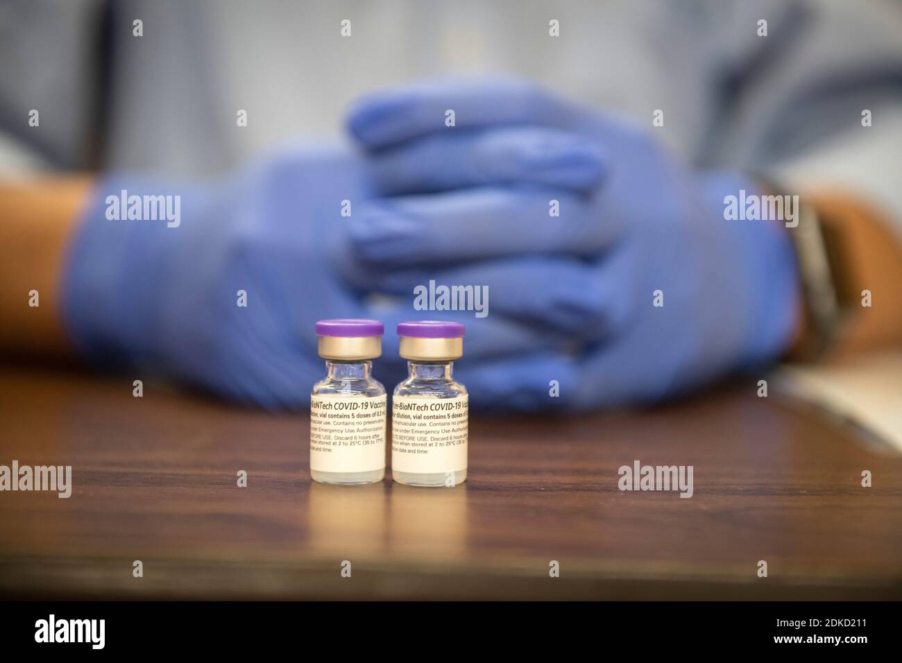 Two vials containing the first doses of the Pfizer Coronavirus Vaccine being readied for delivery to the arms of front line health care workers in Colorado Springs, Colorado, USA. 14th Dec, 2020. First dose of Pfizer COVID-19 vaccine in Colorado Springs Credit: Chuck Bigger/Alamy Live News Stock Photo
