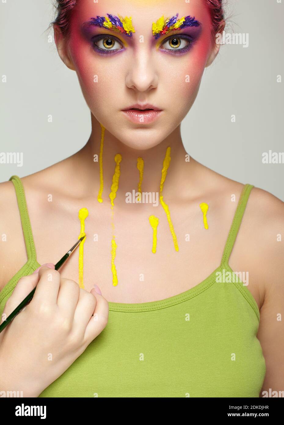 Portrait of female neck on grey background closeup. girl with c