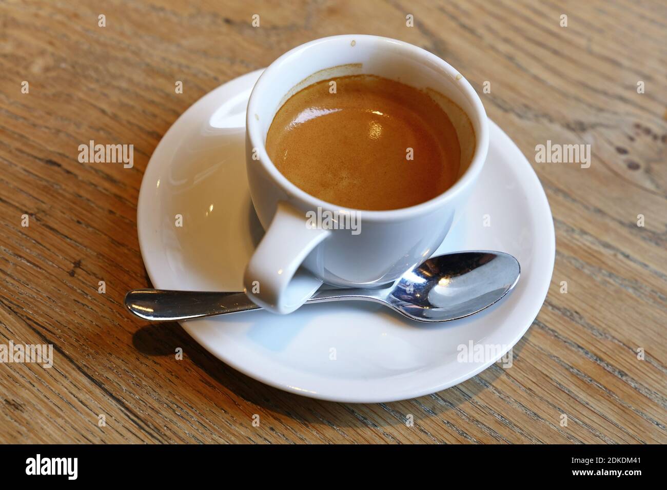 High Angle View Of Coffee On Wooden Table Stock Photo