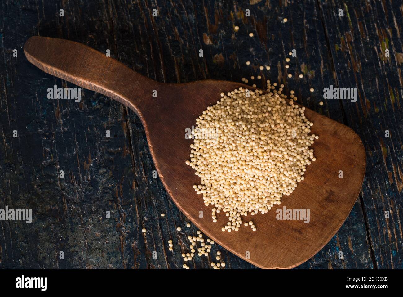 Close-up Of Ingredients In Wooden Spoon On Table Stock Photo