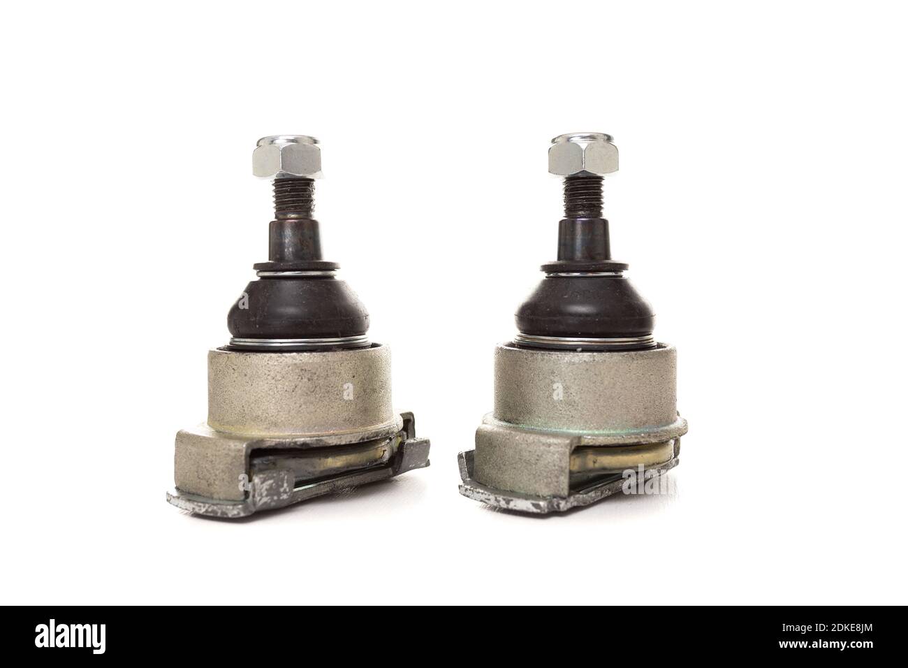 two ball joints on white isolated background, auto repair shop concept