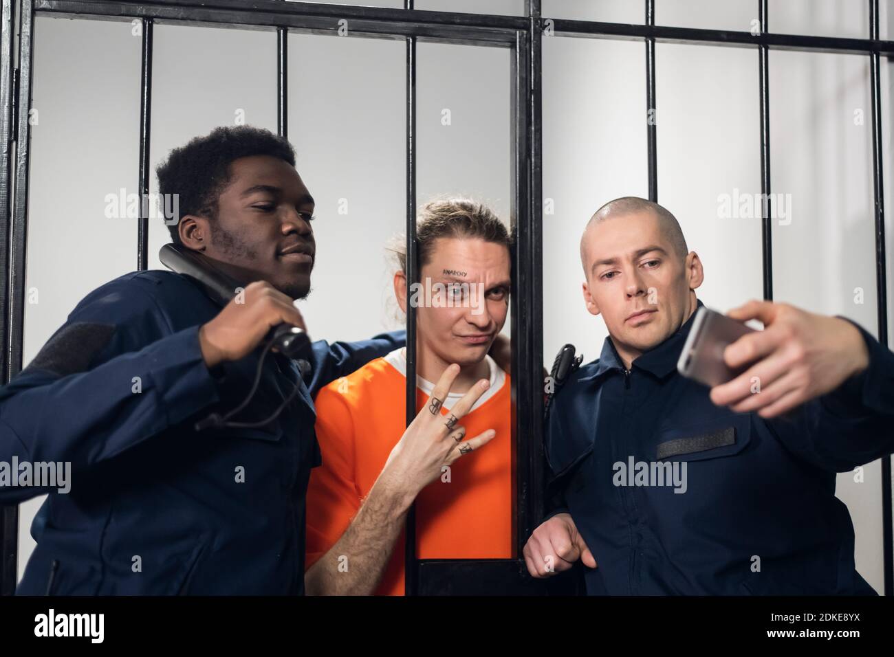Actors on the set of a movie about prison make a funny selfie in a ...