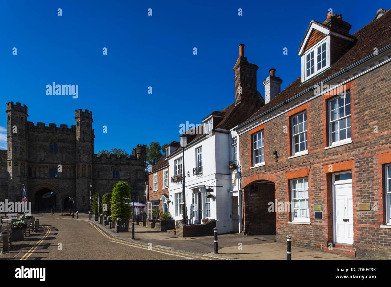 England, East Sussex, Battle, High Street Shops and Battle Abbey Gatehouse Stock Photo