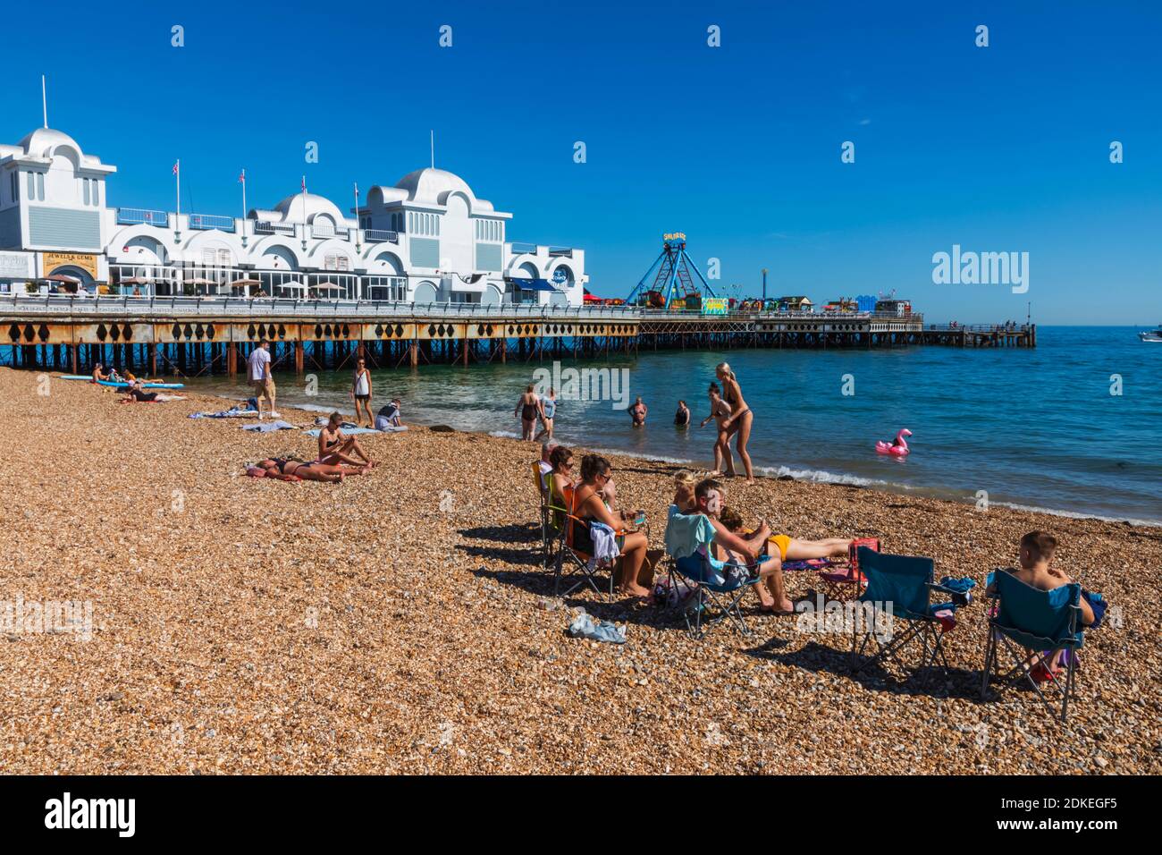 England, Hampshire, Portsmouth, Southsea, Beach and South Parade Pier Stock Photo