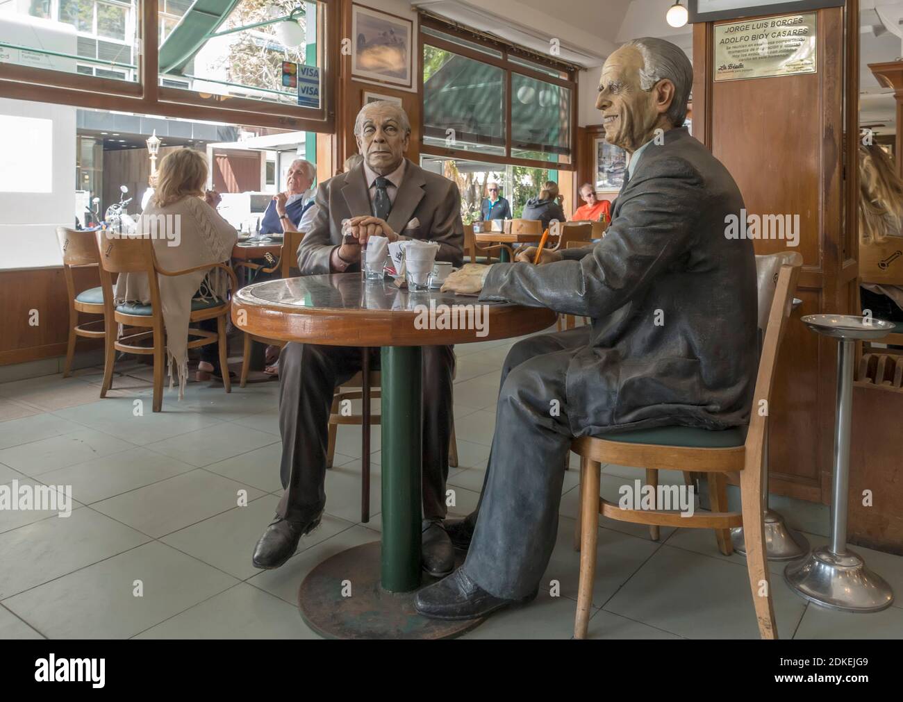 Statues of Argentine writers Jorge Luis Borges and Adolfo Bioy Casares in La Biela cafeteria, Recoleta, Buenos Aires, Argentina Stock Photo