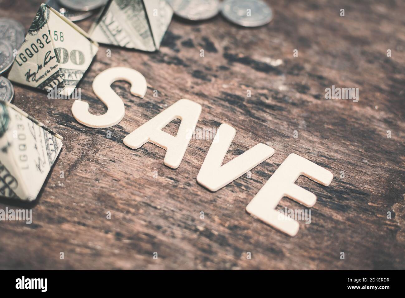High Angle View Of Save Text On Wooden Table Stock Photo