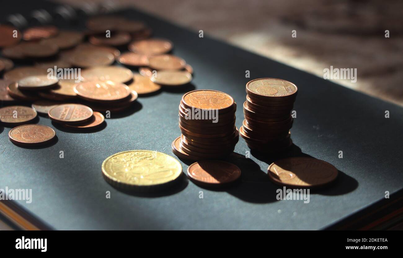 Assorted piles of coins. Money concept, currency or business profit ...