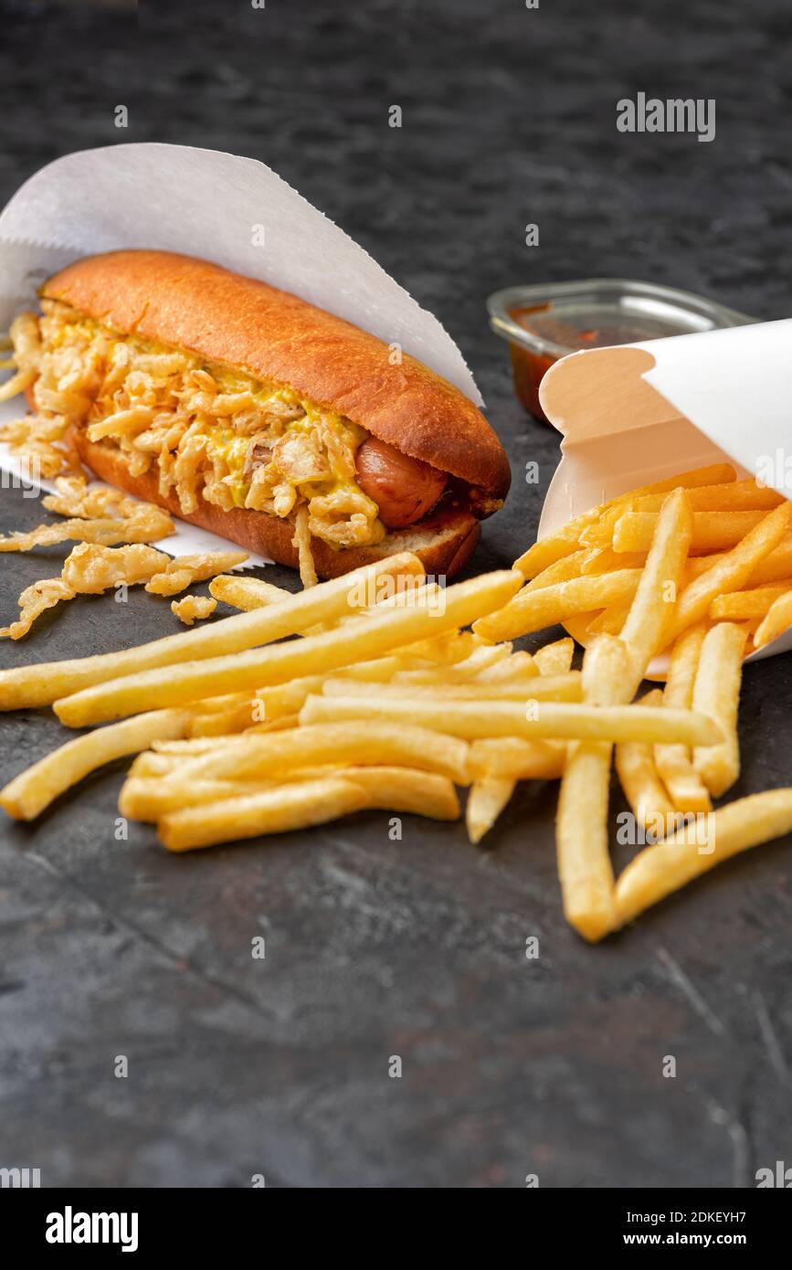 Fast food Hot dogs and French fries. Healthy snacks for takeaway