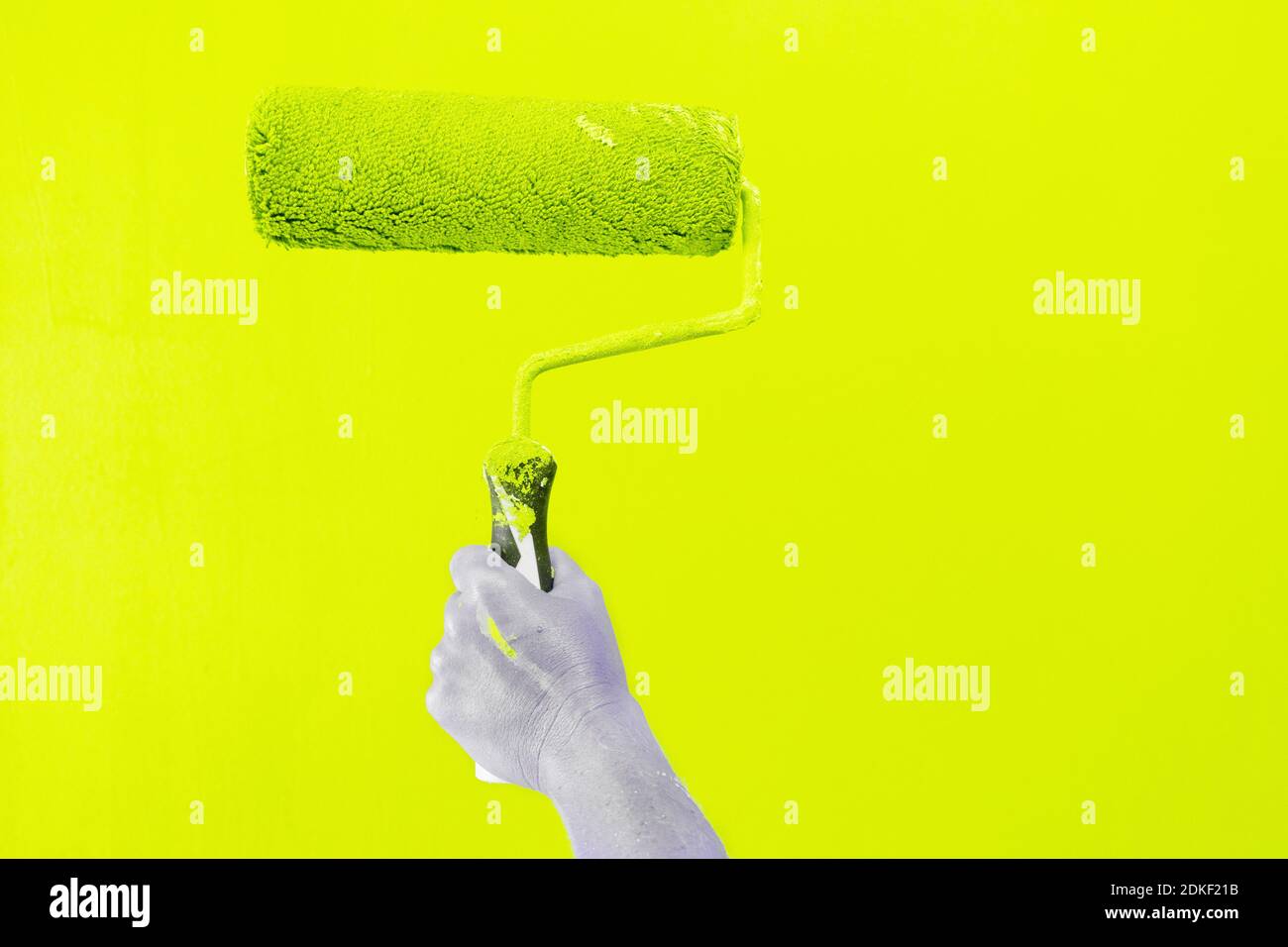 Someone painting wall Stock Photo