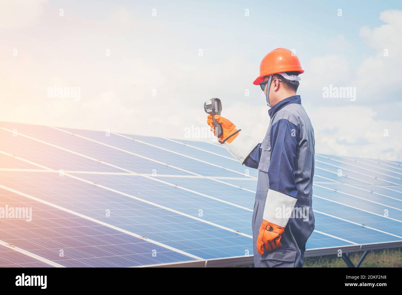 engineer or electrician working on maintenance equipment at industry