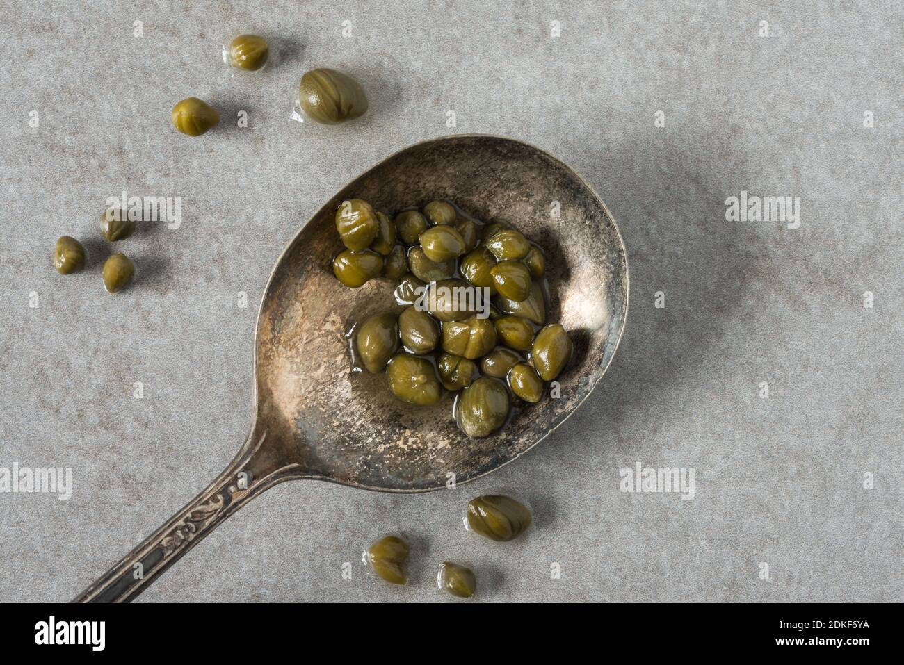 Directly Above Shot Of Olives In Spoon Stock Photo