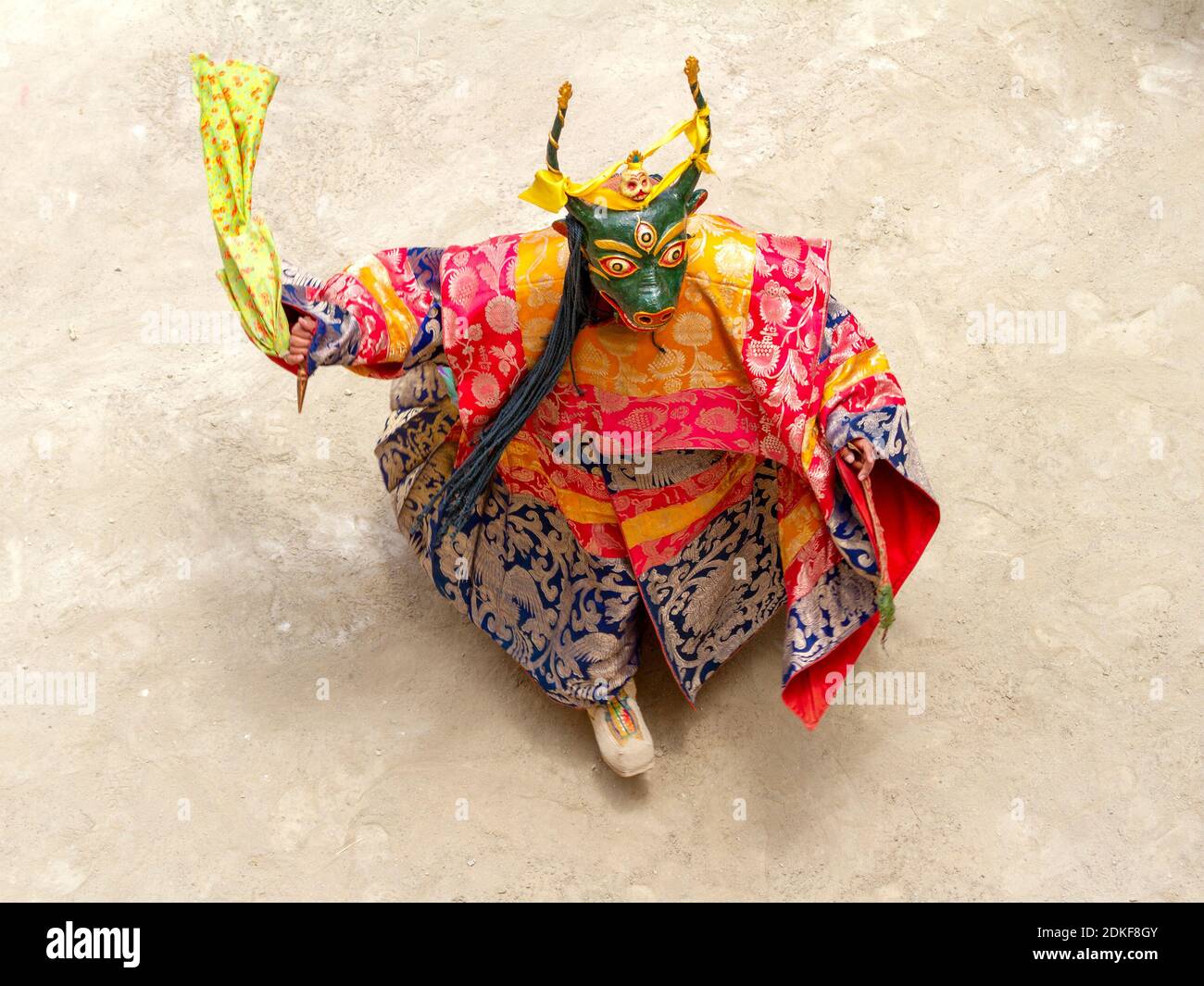 Unidentified monk in a bull deity mask with ritual dagger (phurpa ...
