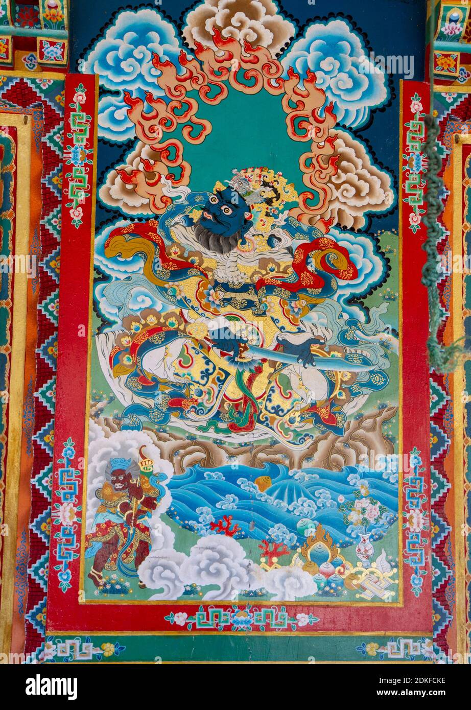 Ralang, India - Dec 29, 2011: Dharmapala wrathful deity colorful wall painting, spiritual and ritual symbol of Buddhism, in Ralang monastery, Sikkim, Stock Photo
