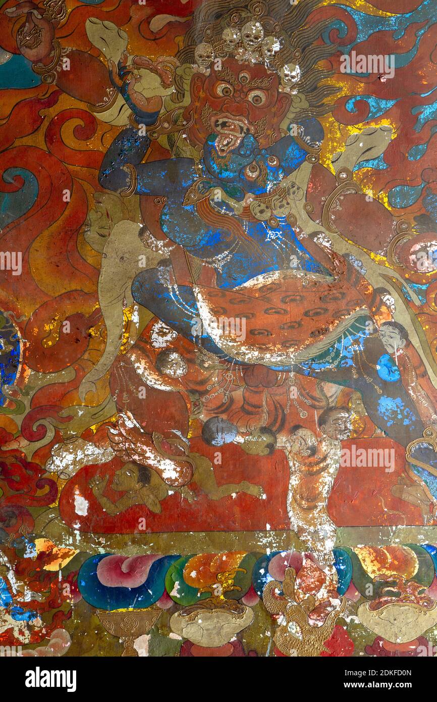 Pemayangtse, India - Dec 31, 2011: Dharmapala wrathful deity colorful wall painting, spiritual and ritual symbol of Buddhism, in Pemayangtse monastery Stock Photo