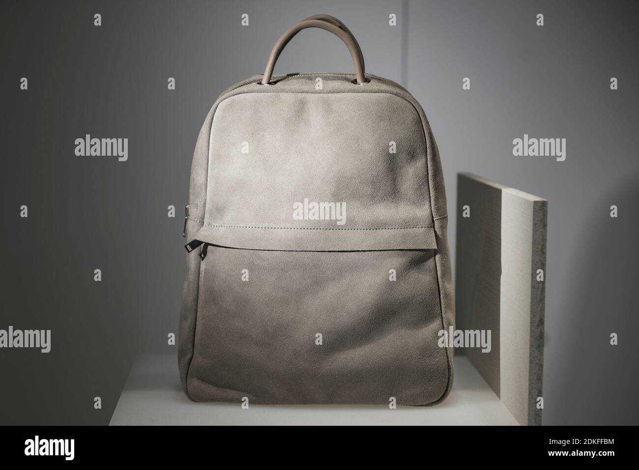 Elegant backpack in a store - shopping concept Stock Photo - Alamy