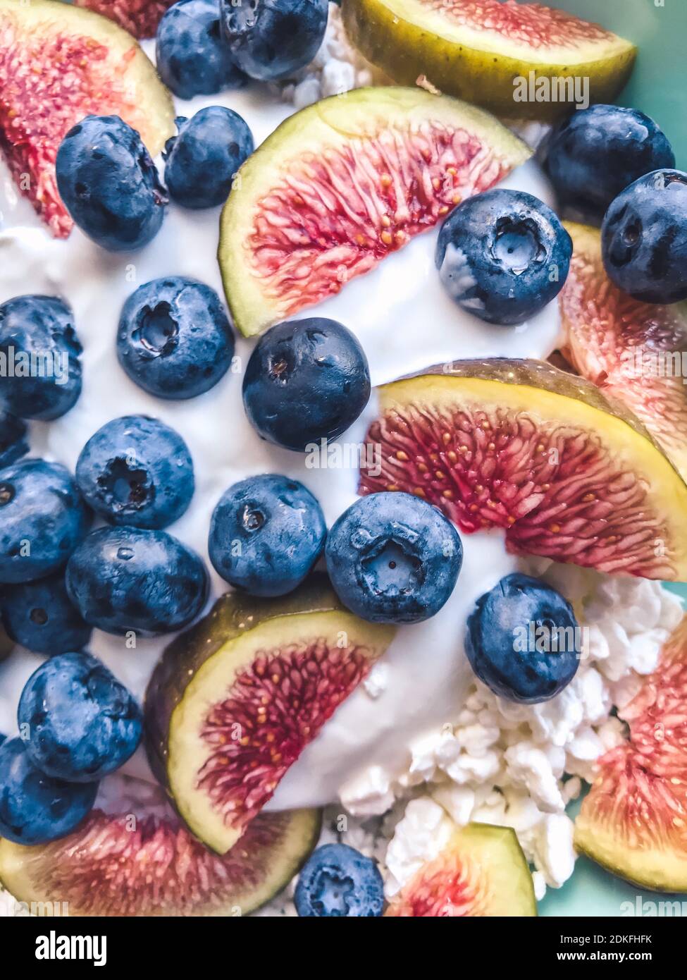 Healthy protein fruit breakfast with greek yoghurt and cottage cheese